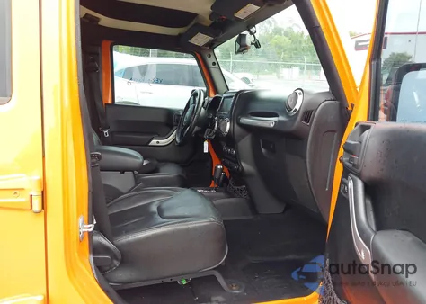 2013 Jeep Wrangler Unlimited Sahara z USA, uszkodzony, nr VIN 1C4HJWEGXDL528075